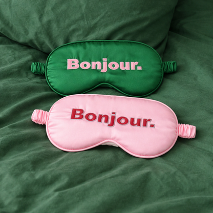 Masques pour les yeux rose et vert, avec message "BONJOUR"