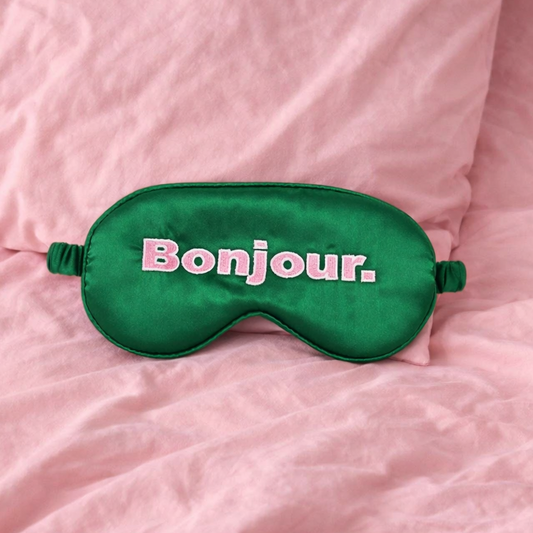 Masque pour les yeux vert et rose avec message "BONJOUR"