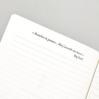 page intérieure du carnet avec citation 
