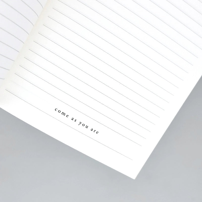 Phrase positive inscrite à l'intérieur du carnet