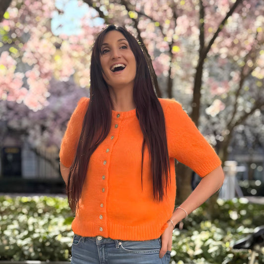 zoom sur gilet orange douillet manche courte