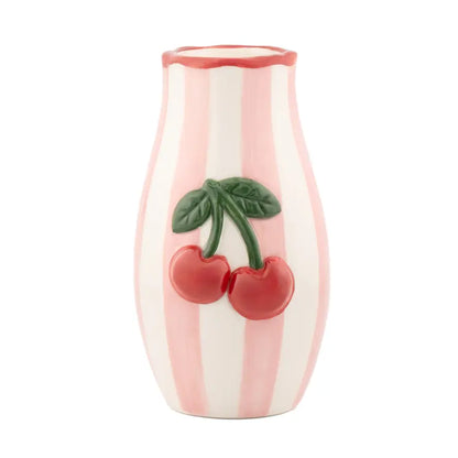 mini vase avec cerise, vue de face