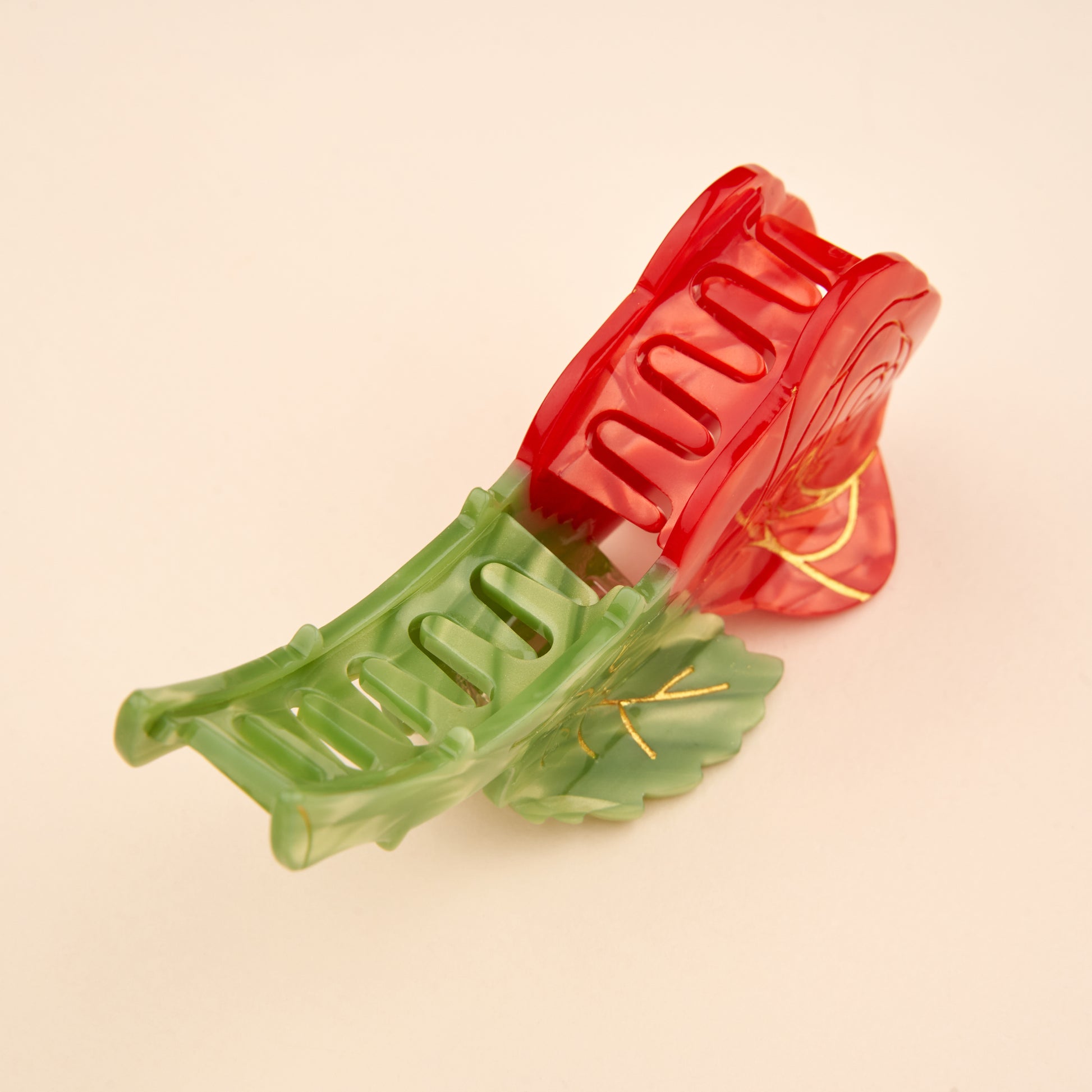 pince cheveux en forme de rose vue sur le coté 