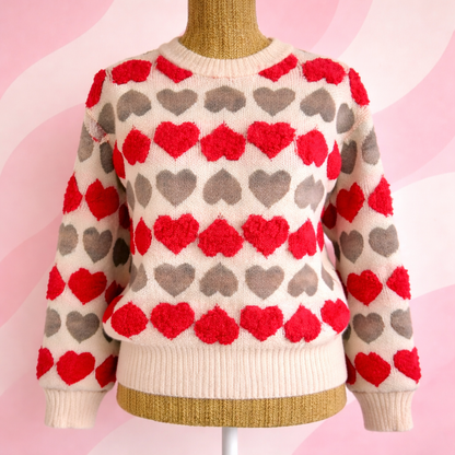 pull cœur rose kaki sur fond coloré