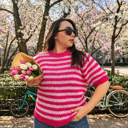 zoom sur pull manche courte rose fabriqué en italie 